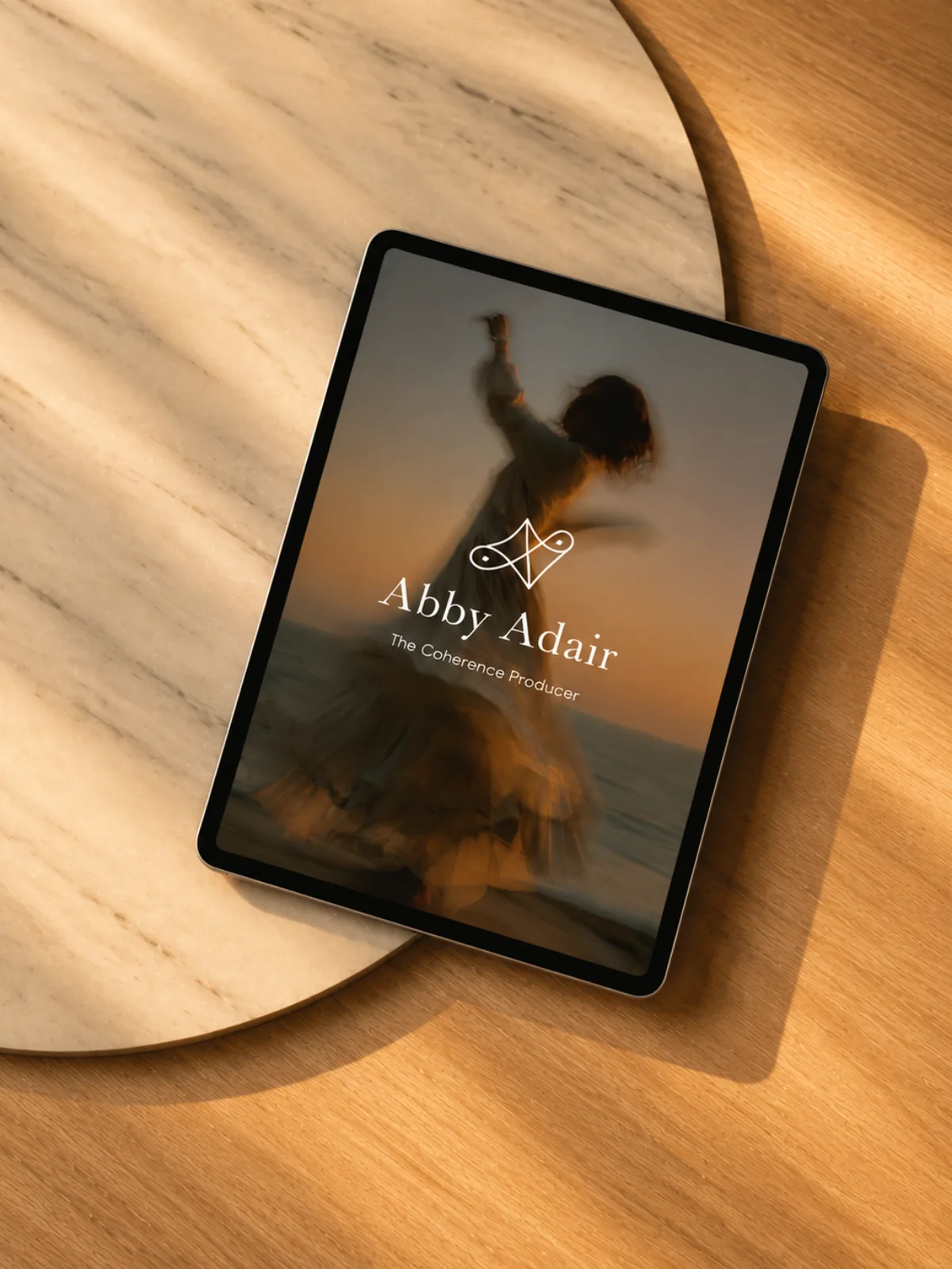 Abby Adair Reinhard website displayed on a tablet