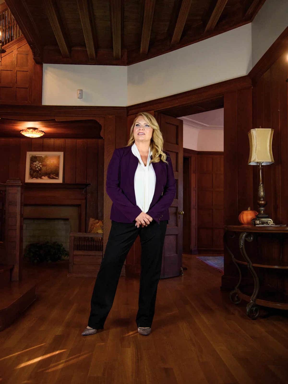 Cheryl LaTray standing portrait in a tailored look