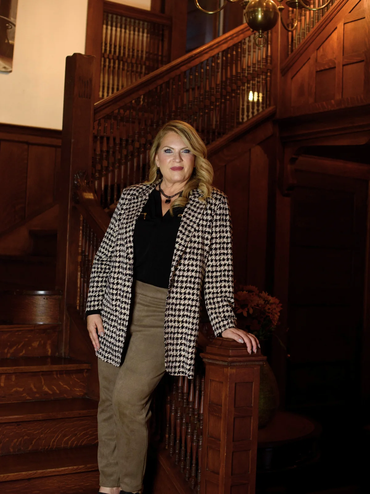 Cheryl LaTray seated portrait in a tailored look