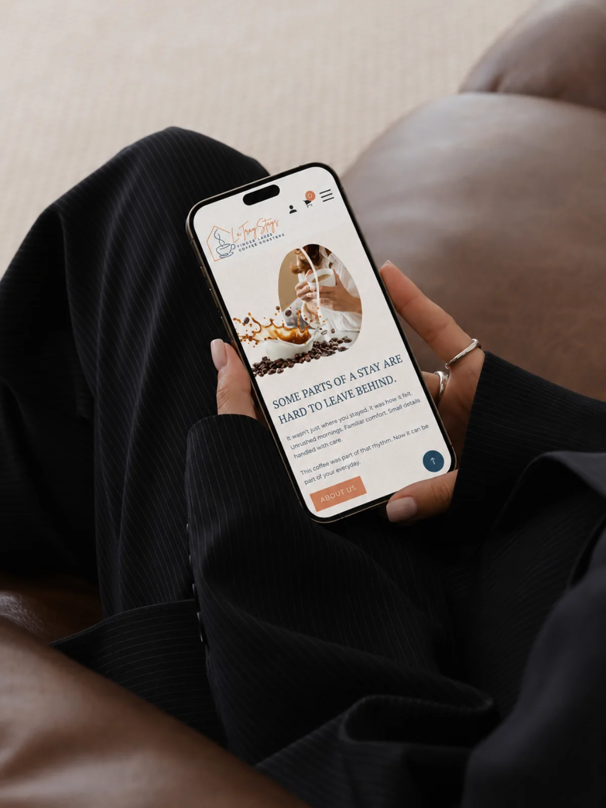LaTray Stays and Finger Lakes Coffee Roasters website on a phone