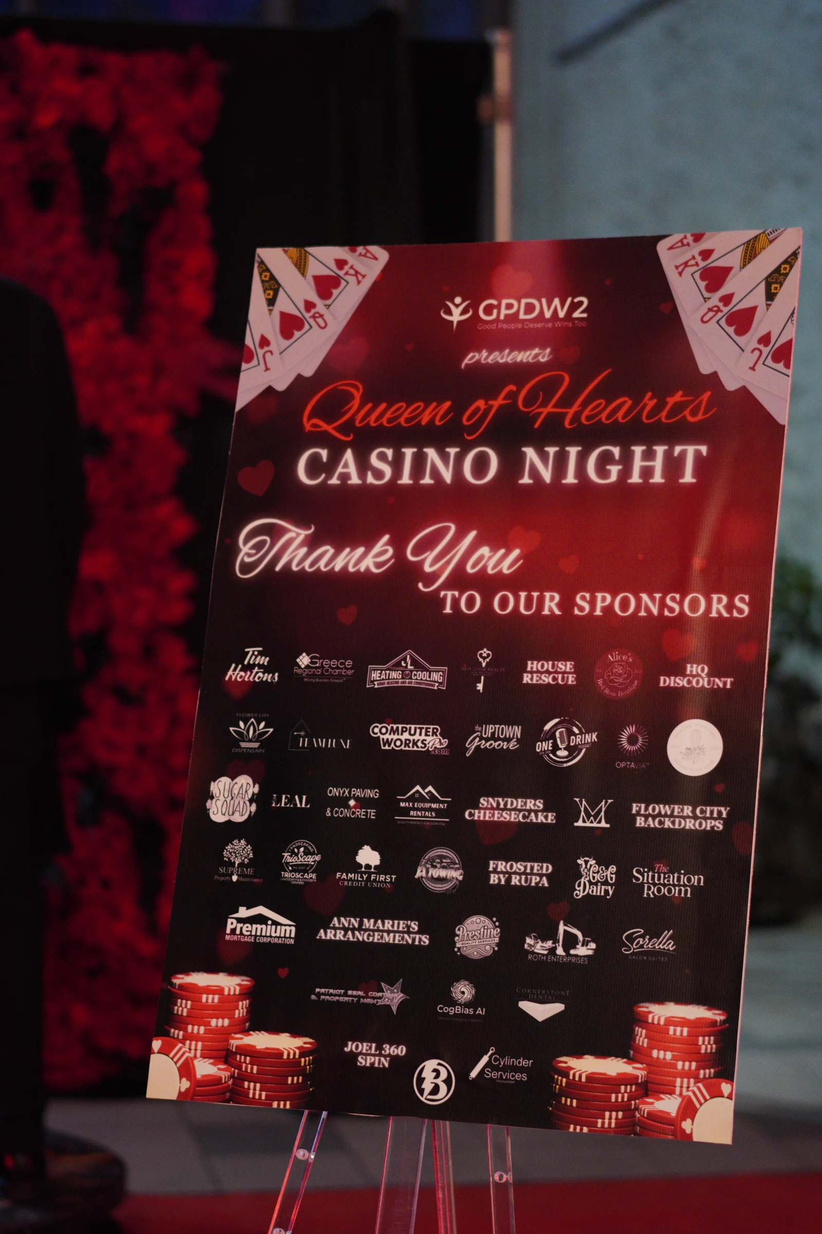 Queen of Hearts sponsor display at the gala