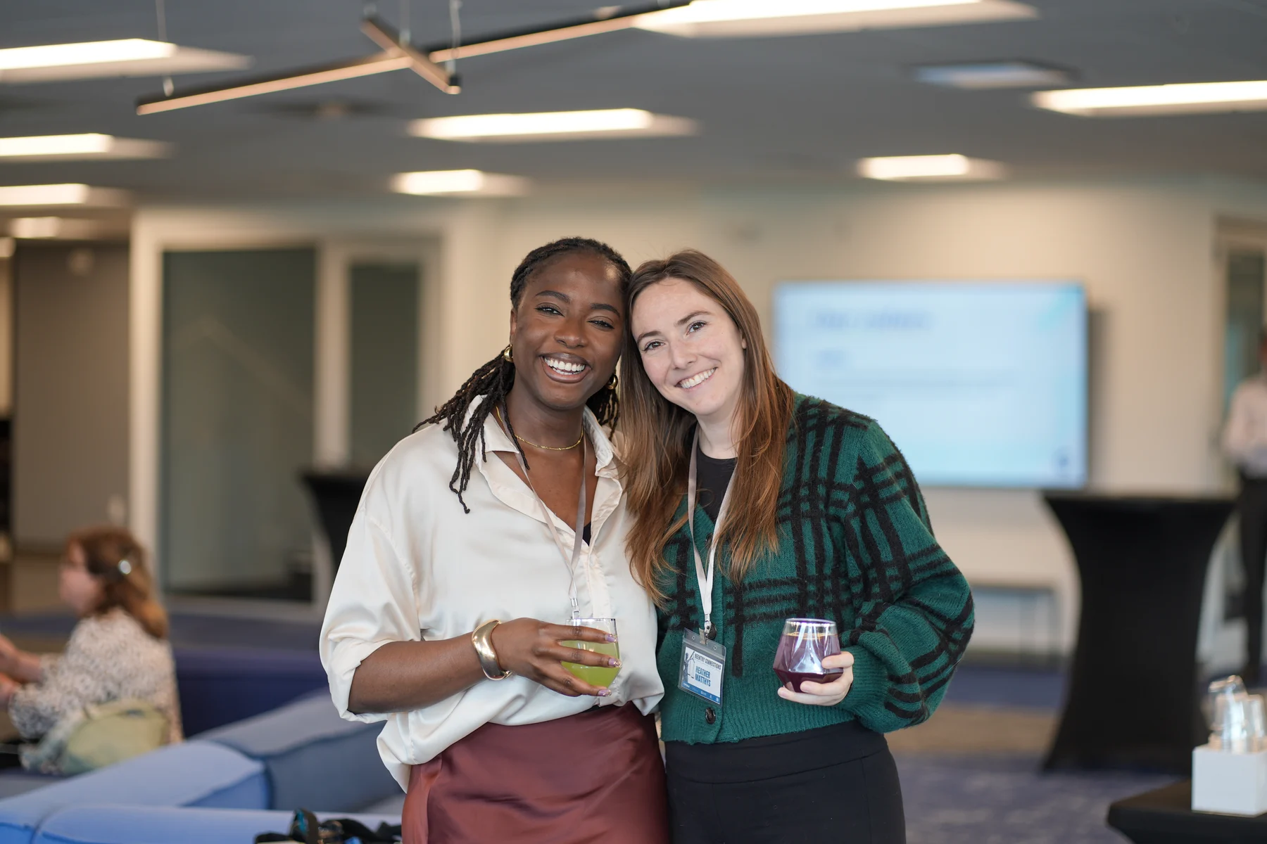 Two attendees sharing a moment at the RAWNY conference