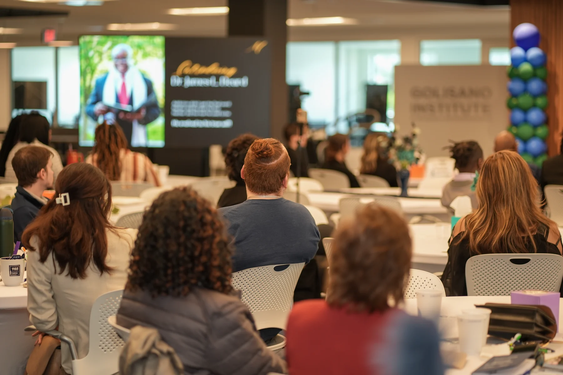 Audience watching a presentation during the RAWNY conference