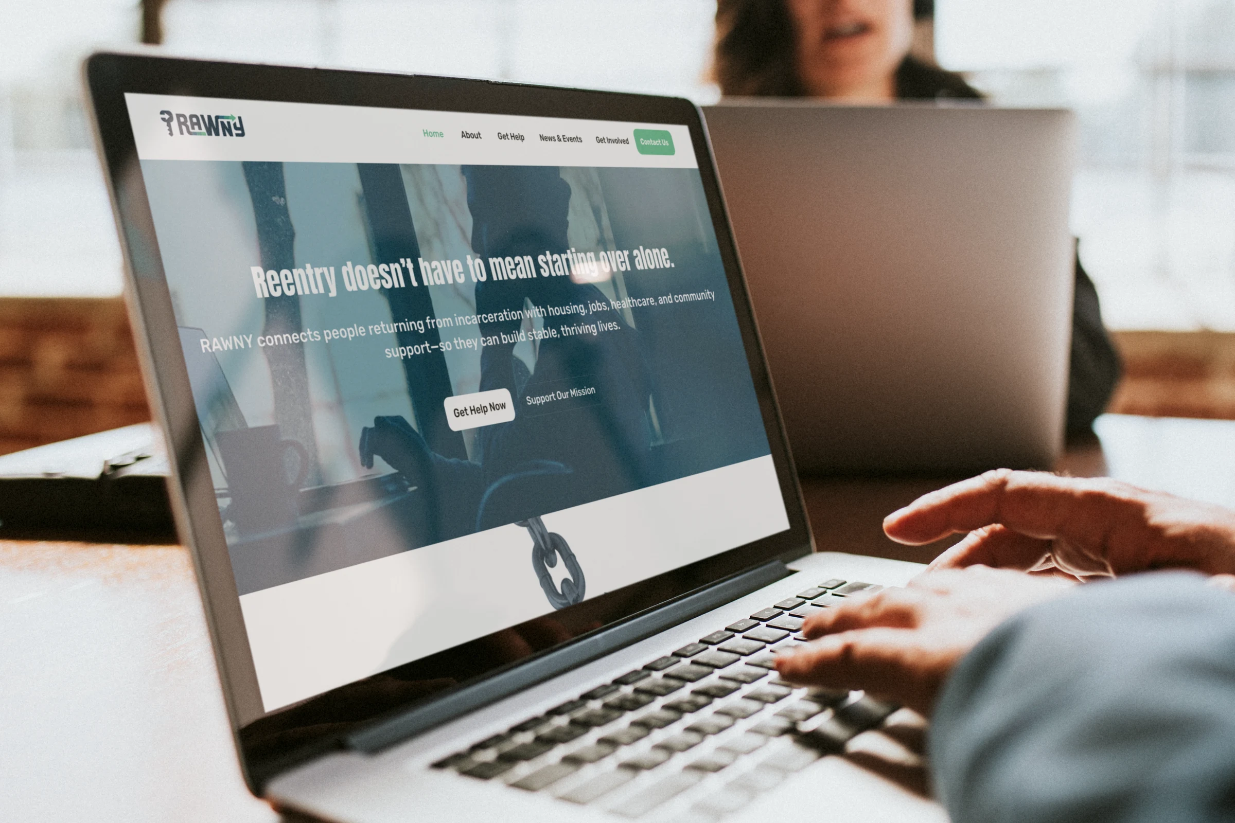 RAWNY website displayed on a laptop