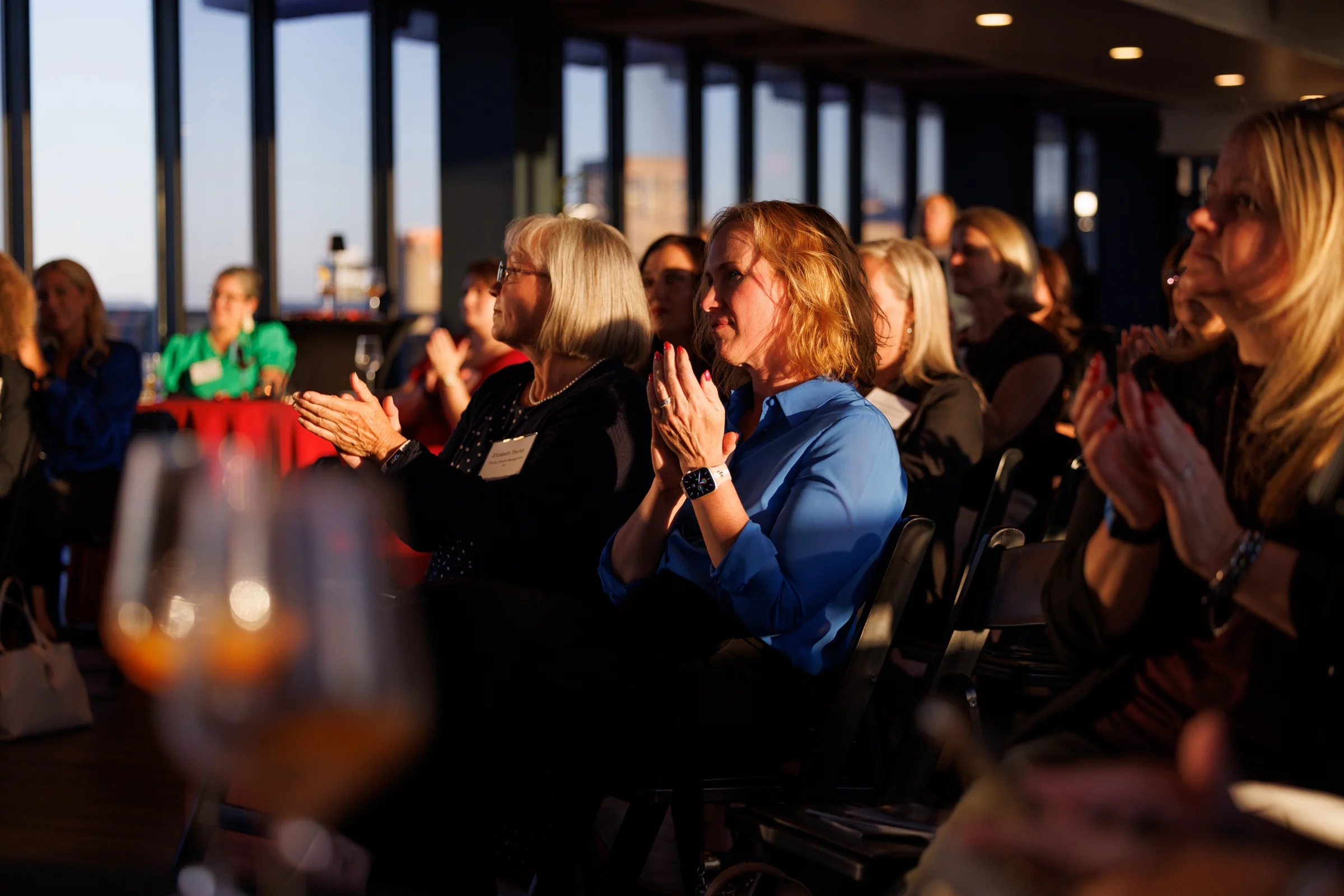 Audience members engaged during the presentation